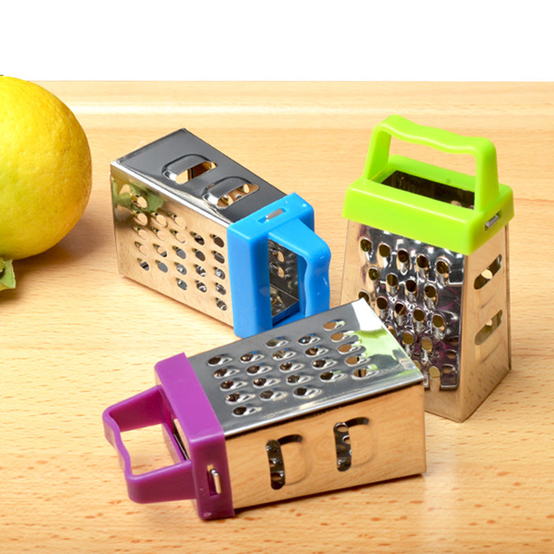Mini cheese grater - Four-sided grater - Stainless steel slicer - Multifunctional vegetable cutter - Kitchen gadget - Lemon zester - A green