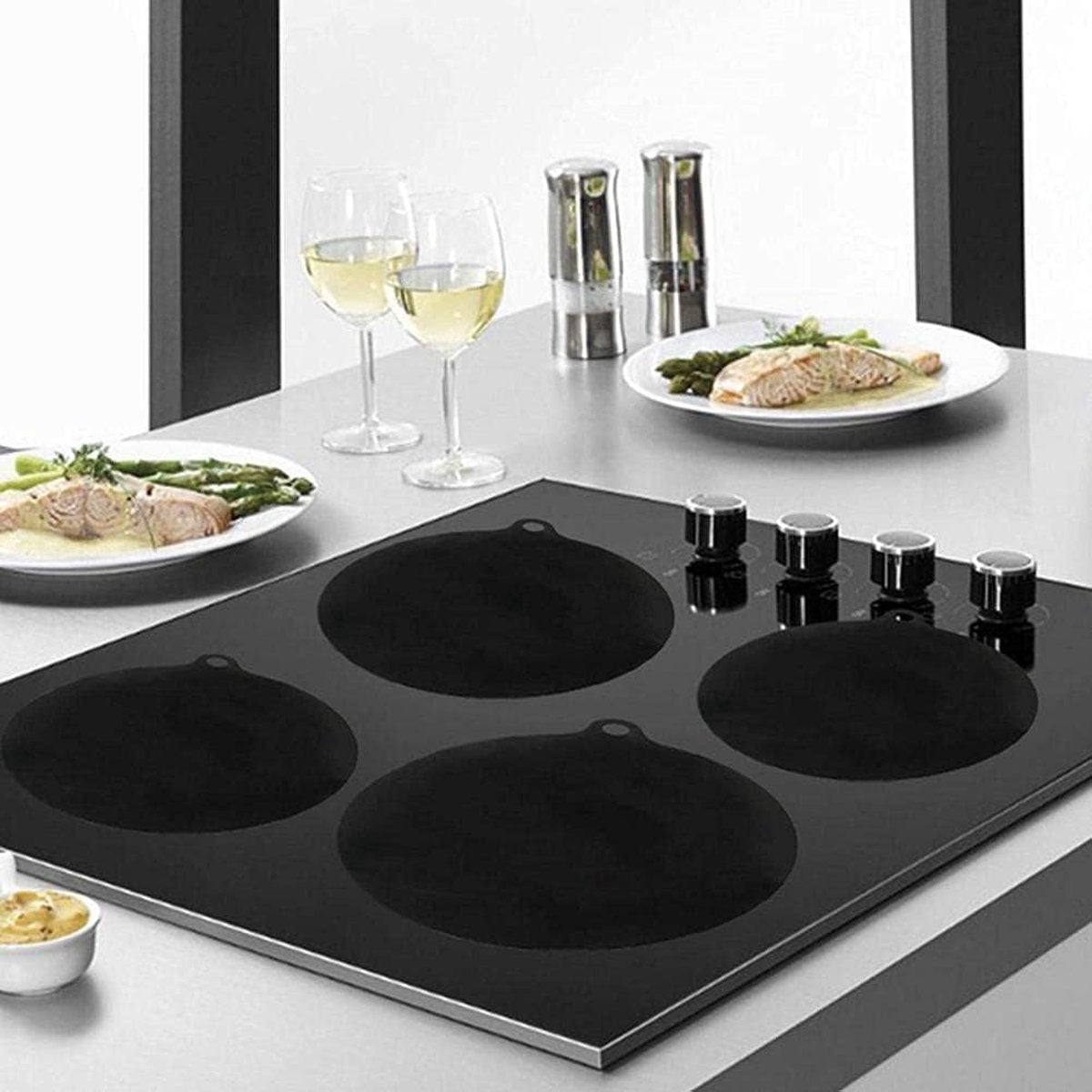Induction Protector Set - 4 Pieces - 22cm - Pan Protectors - Induction Cover Plate - Cooktop Cover Plate - Round Induction Mats - Heat Resistant Up to 230 ºC - BPA-Free - Non-Slip - Dishwasher Safe - Pan Coaster - Coaster - Black