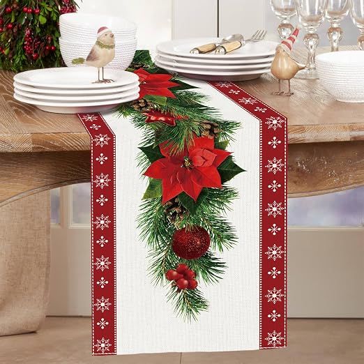 Set of 2 rustic-style red Christmas table runners featuring snowflake and poinsettia patterns, measuring 33 x 183 cm