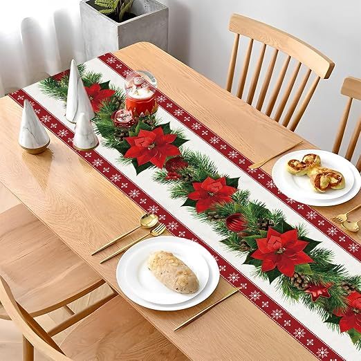 Set of 2 rustic-style red Christmas table runners featuring snowflake and poinsettia patterns, measuring 33 x 183 cm