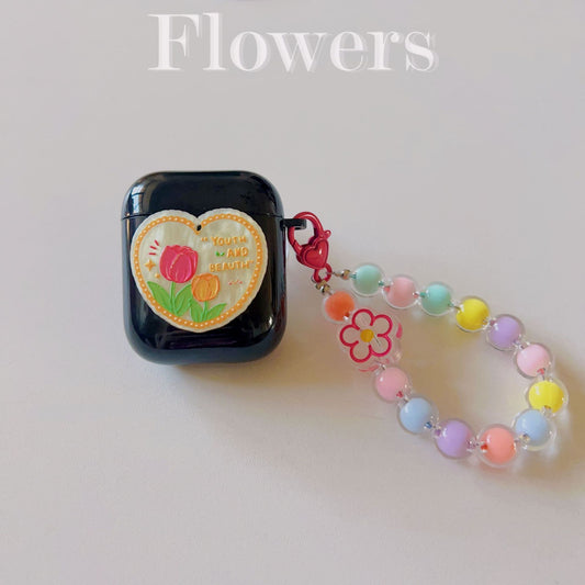 Floral patches + black base shell + colorful bracelet AirPods 1/2