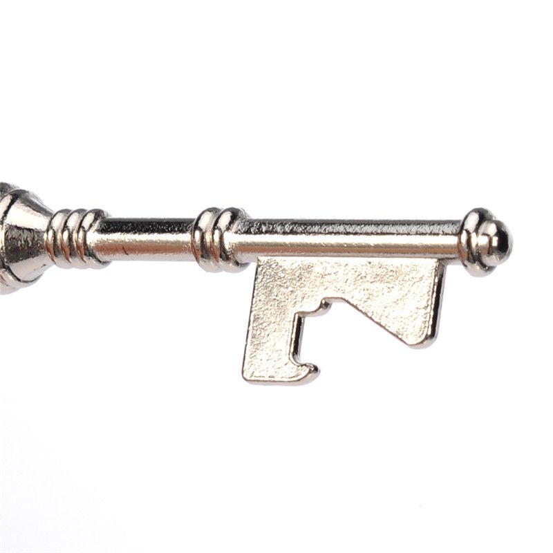 Vintage silver key bottle opener and cap opener