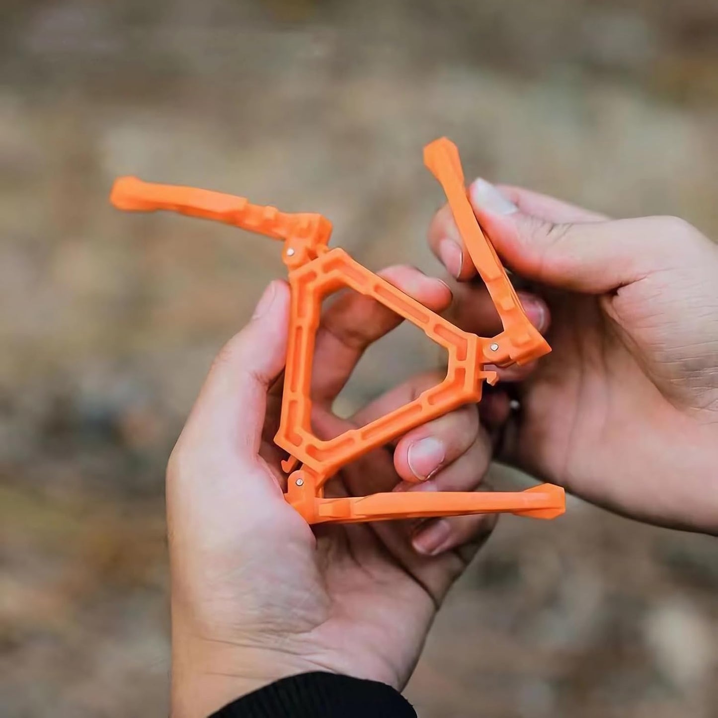 2Pcs Camping Stove Fuel Can Stabilizer, Mini Foldable Outdoor Hiking Cooking Gas Tank Bracket,Foldable Cartridge Canister Tripod (Oranger)
