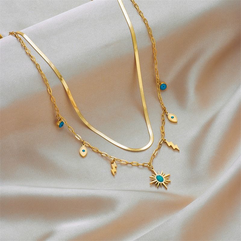 Double-layered bohemian-style necklace, 18K gold-plated titanium choker with eye and lightning bolt pendants