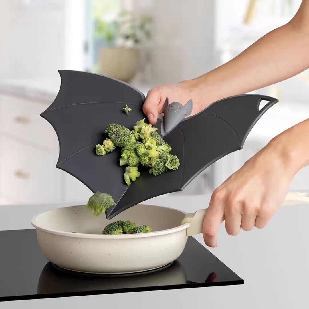 Halloween Bat-Shaped Silicone Cutting Board: Flexible, Heat-Resistant, and Perfect for Spooky Kitchen Prep and Festive Serving (Black)