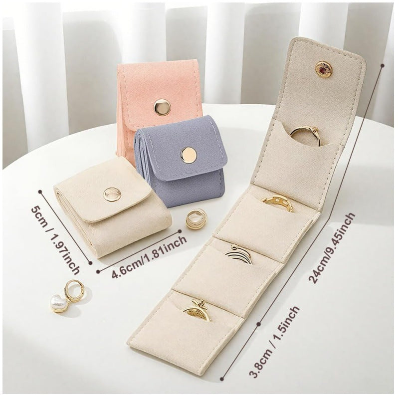 Beige Portable Mini Jewelry Pouch Soft Velvet Travel Organizer for Rings and Earrings Compact Snap Button Storage Bag Ideal for Daily Use