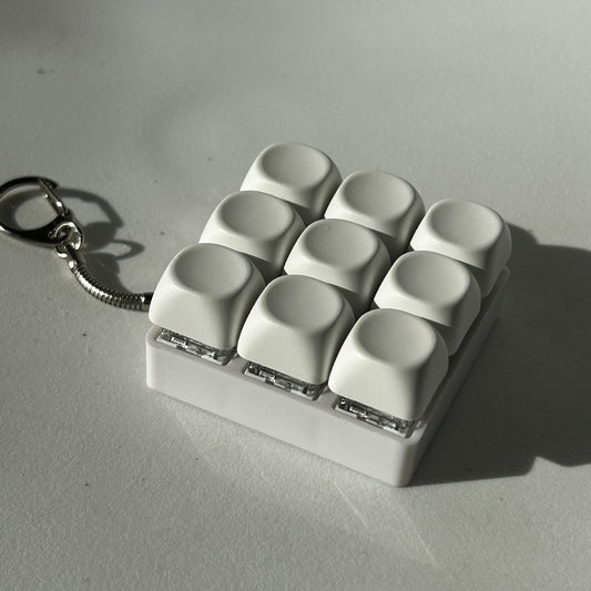 2-Pack White Mechanical 9-Keyboard Fingertip Toy Keychain - Key Pressure Relief, PVC Fingertip Toy