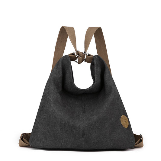 Black Versatile 3-in-1 Canvas Backpack and Shoulder Bag Large Capacity Handbag for Women Ideal for Travel School and Everyday Use