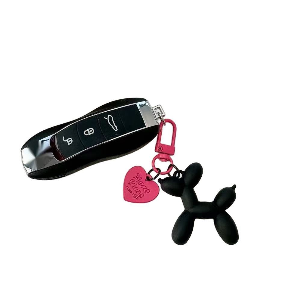2-Piece Silver Balloon Dog Keychain Set with Heart Charm Bag Pendant Cute Couple Gift(Pink button)