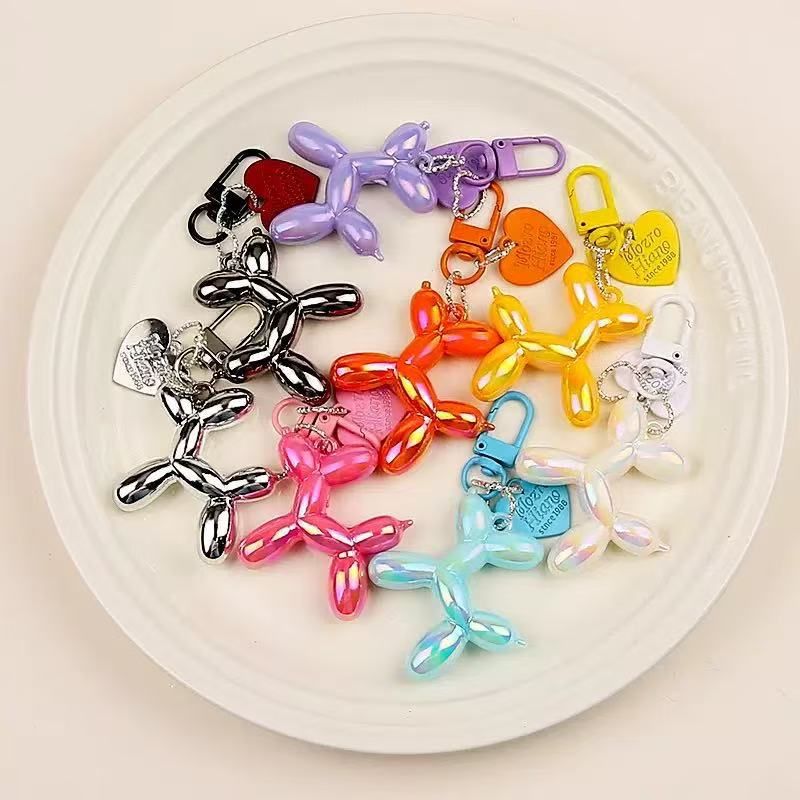 2-Piece Golden Balloon Dog Keychain Set with Heart Charm Bag Pendant Cute Couple Gift